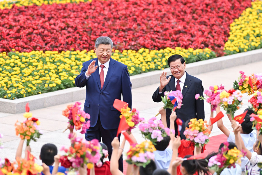 习近平同老挝人革党中央总书记、国家主席通伦会谈