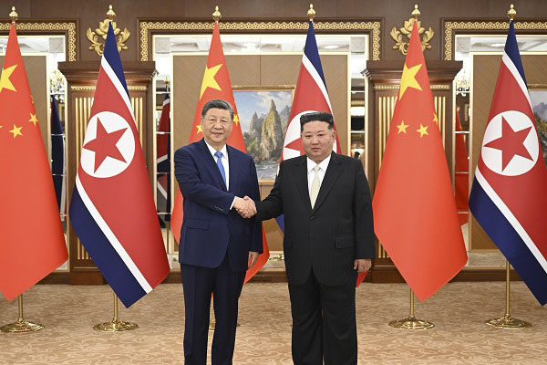 习近平同金正恩举行会谈